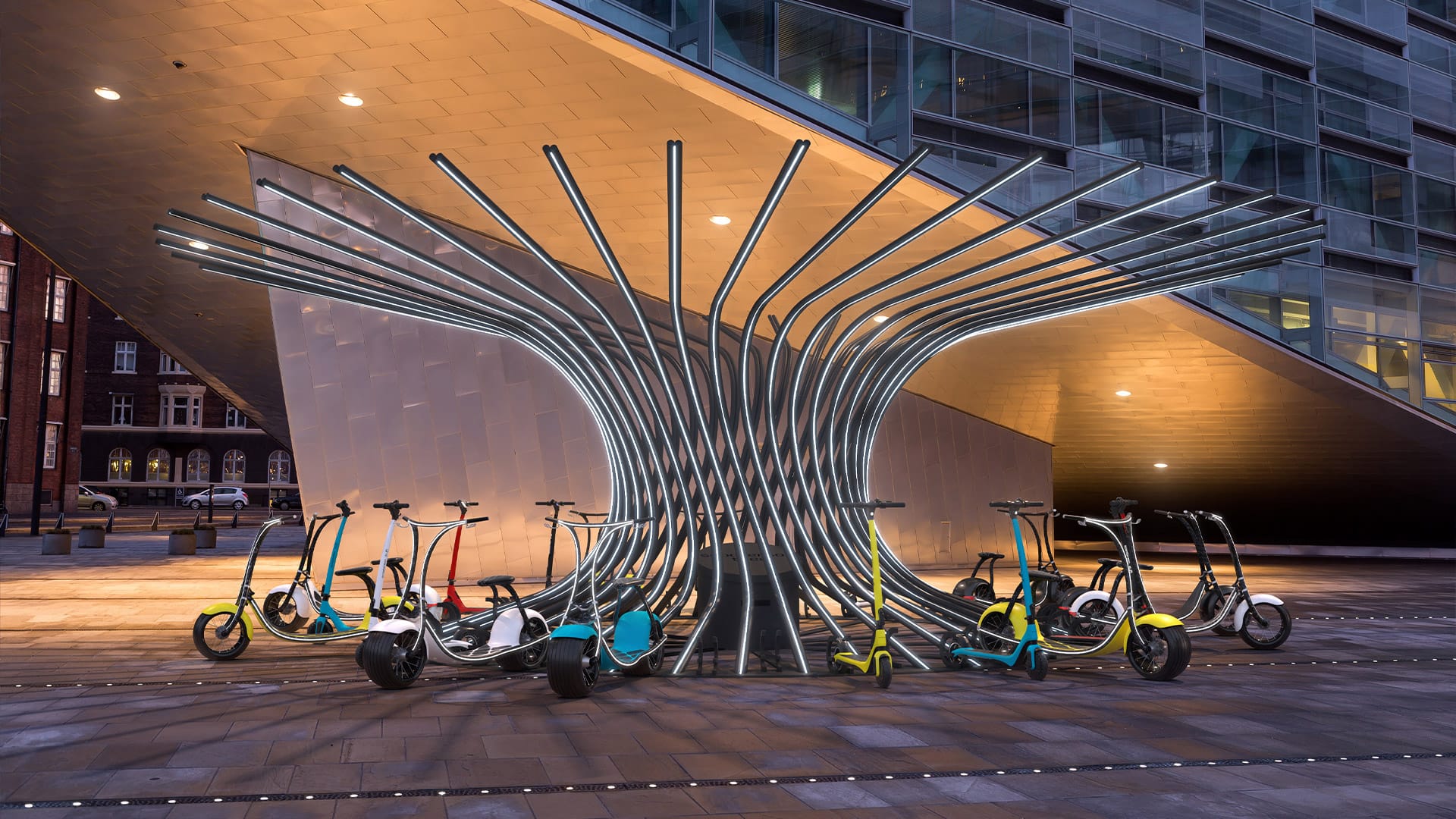 Scooterson Tree, a charging station, with scooters parked around it